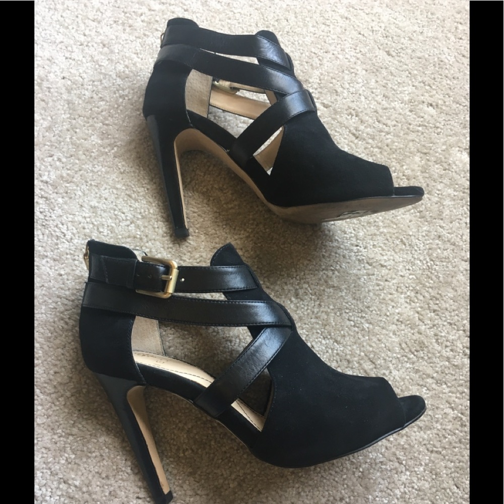 Isola Black back zip heels, size 6.5